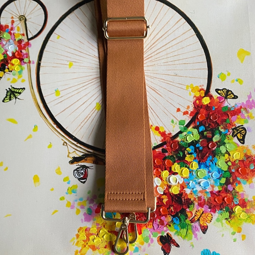 Adjustable Medium Brown Crossbody Strap with Gold Hardware.